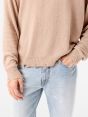 Arty jumper with distressed hem