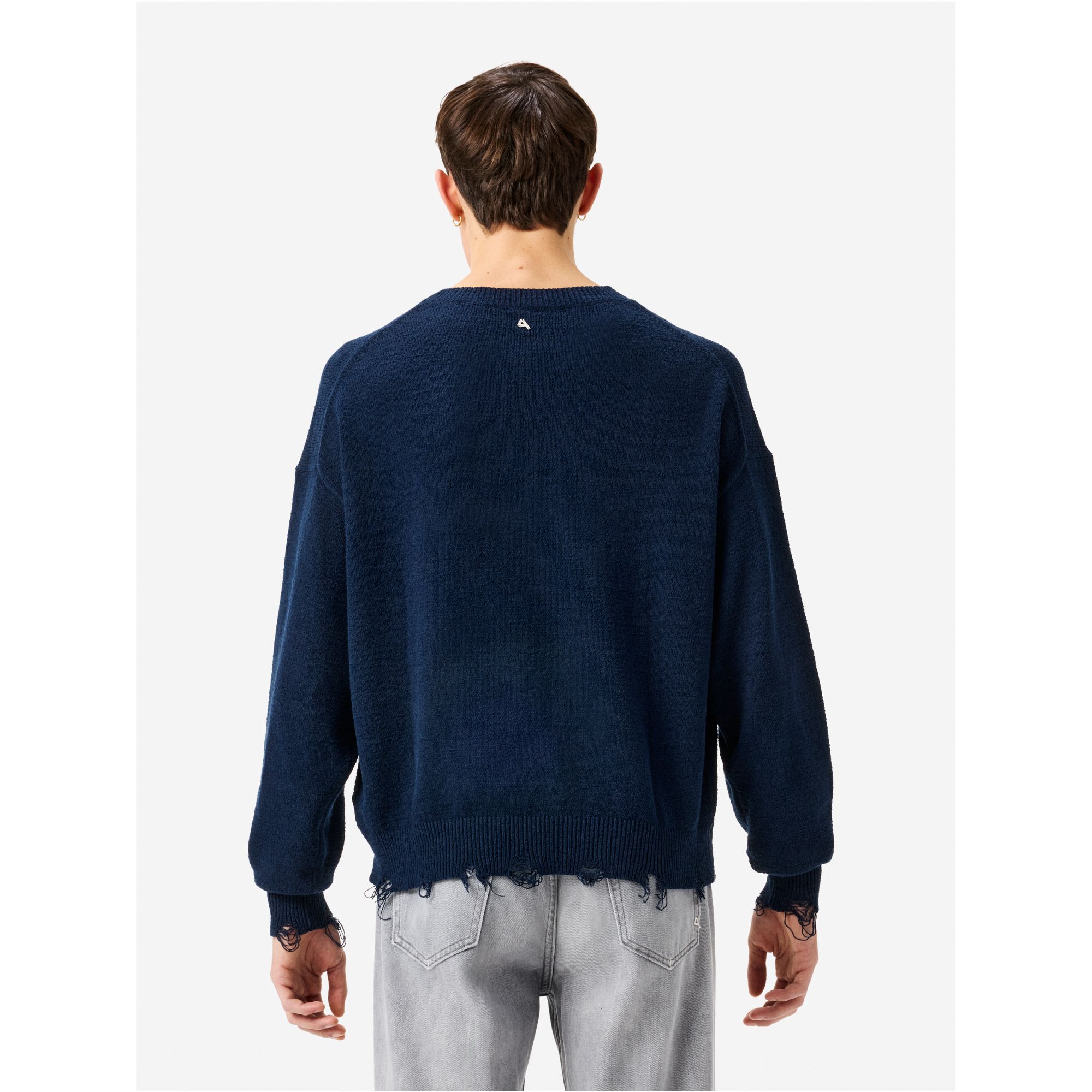 Arty jumper with distressed hem