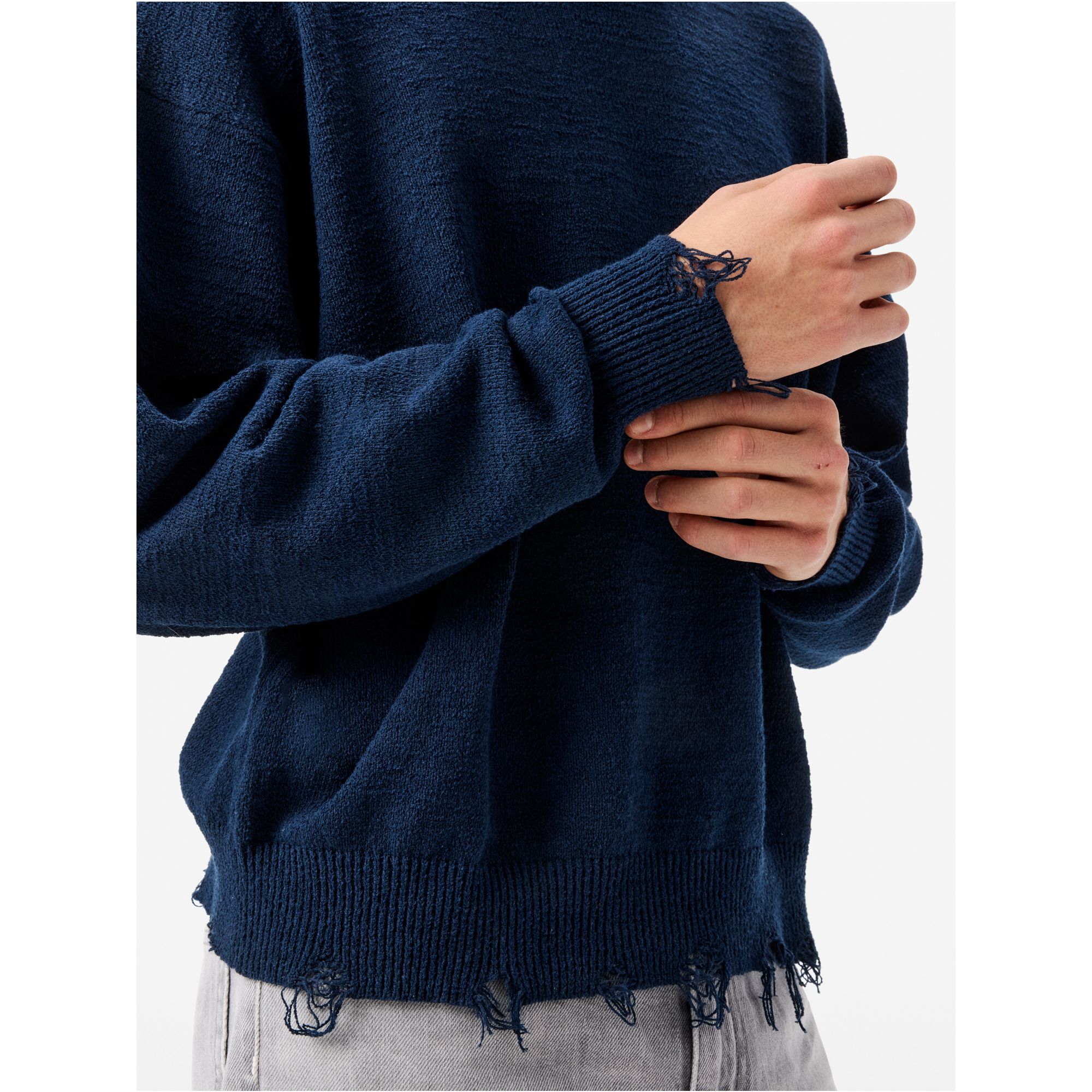 Arty jumper with distressed hem