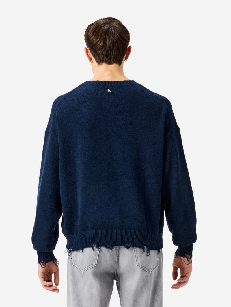 Arty jumper with distressed hem