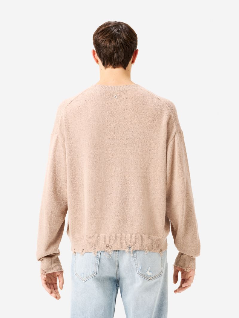 Arty jumper with distressed hem