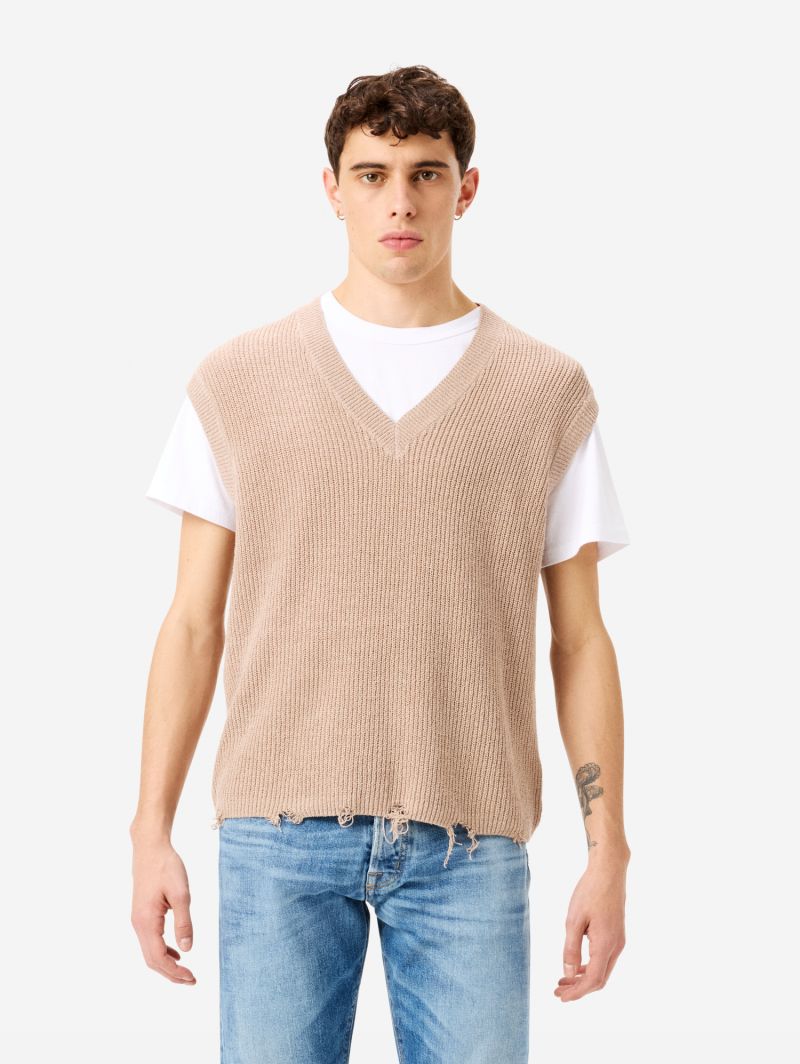 Gilet Eddy a costine con orlo distressed