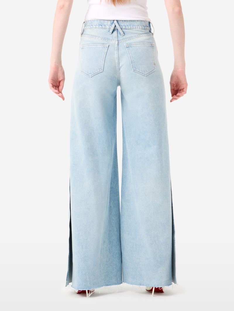 Flared Asia jeans with slits