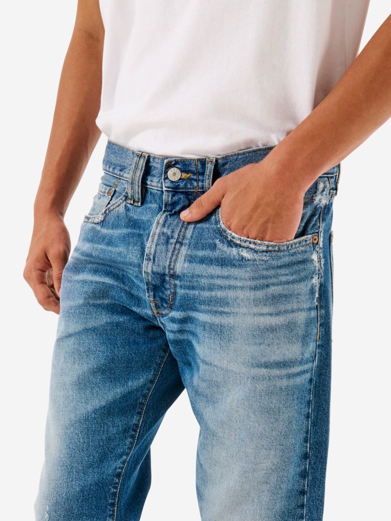 Standard regular straight '90s fit cut and break medium tone open edge