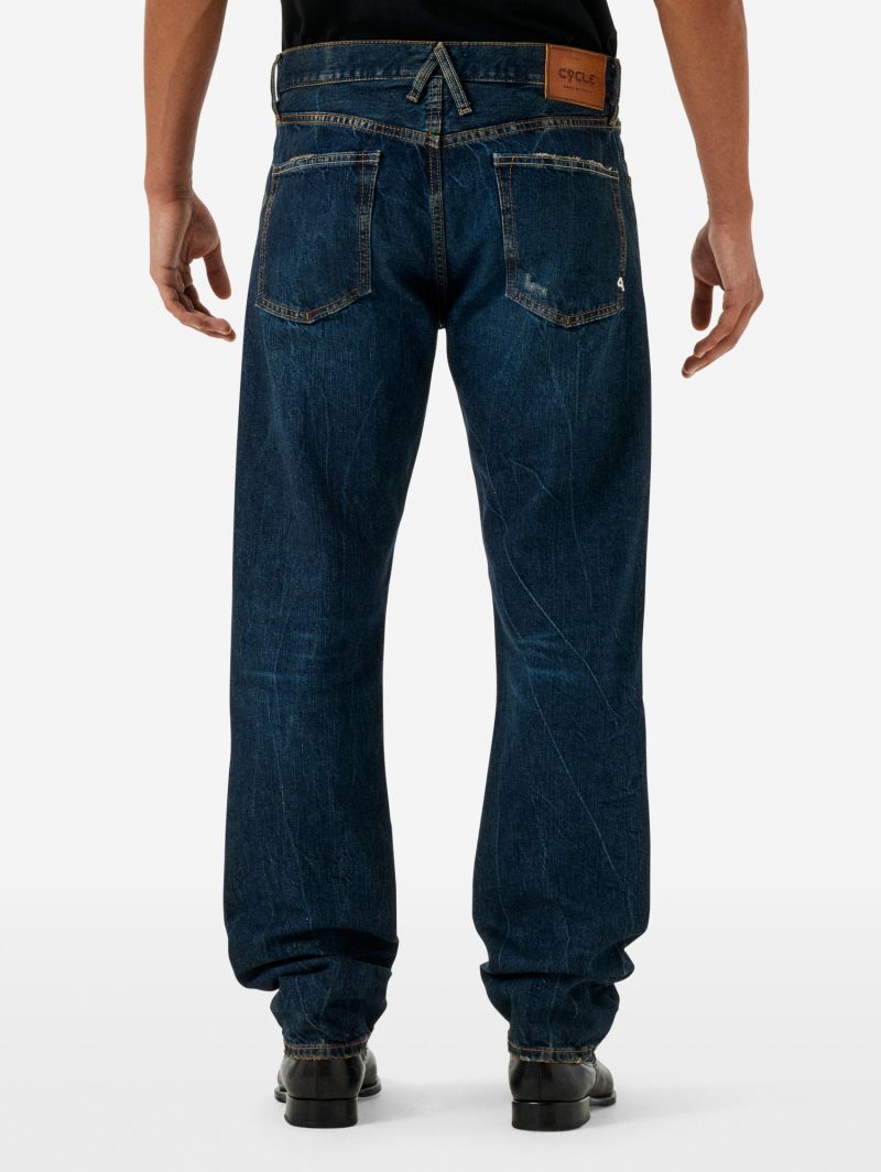Standard regular straight '90s fit dark wash damaged and resinated