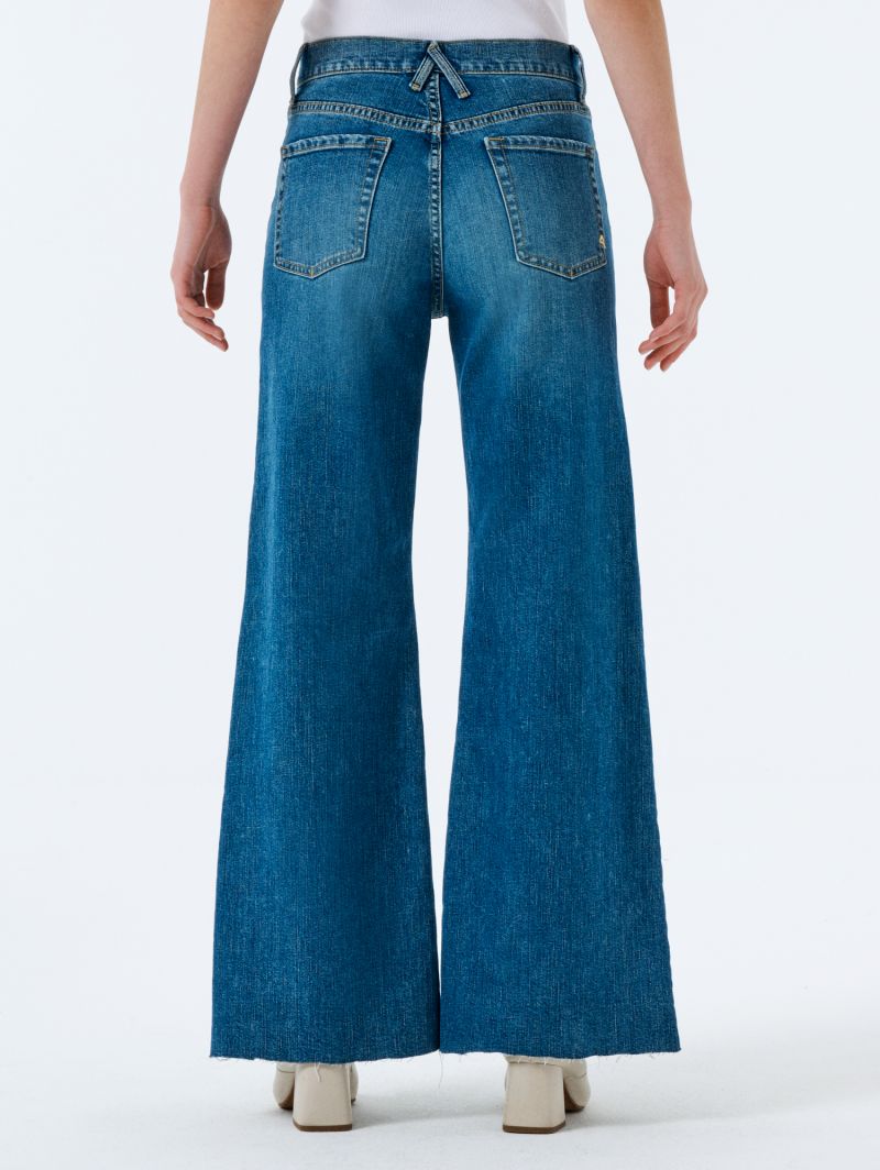 Luna mid rise flared medium vintage destroyed edge