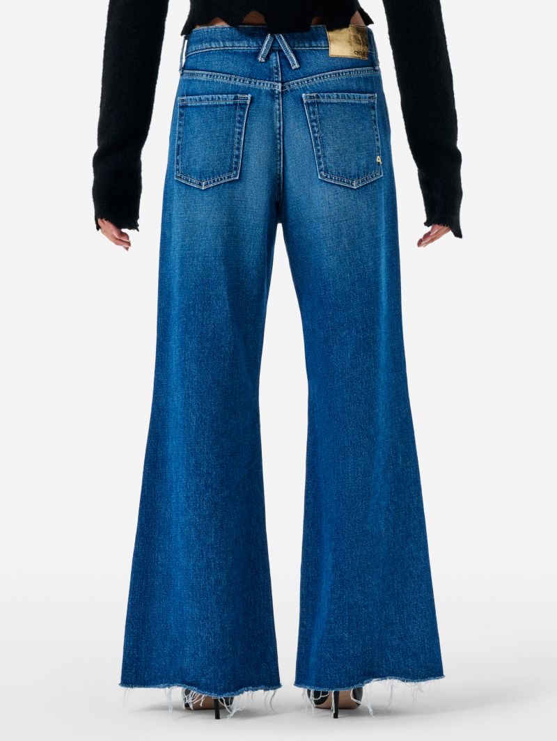 LUNA MID RISE FLARED MID TONE STONE WASH DESTROYED EDGE